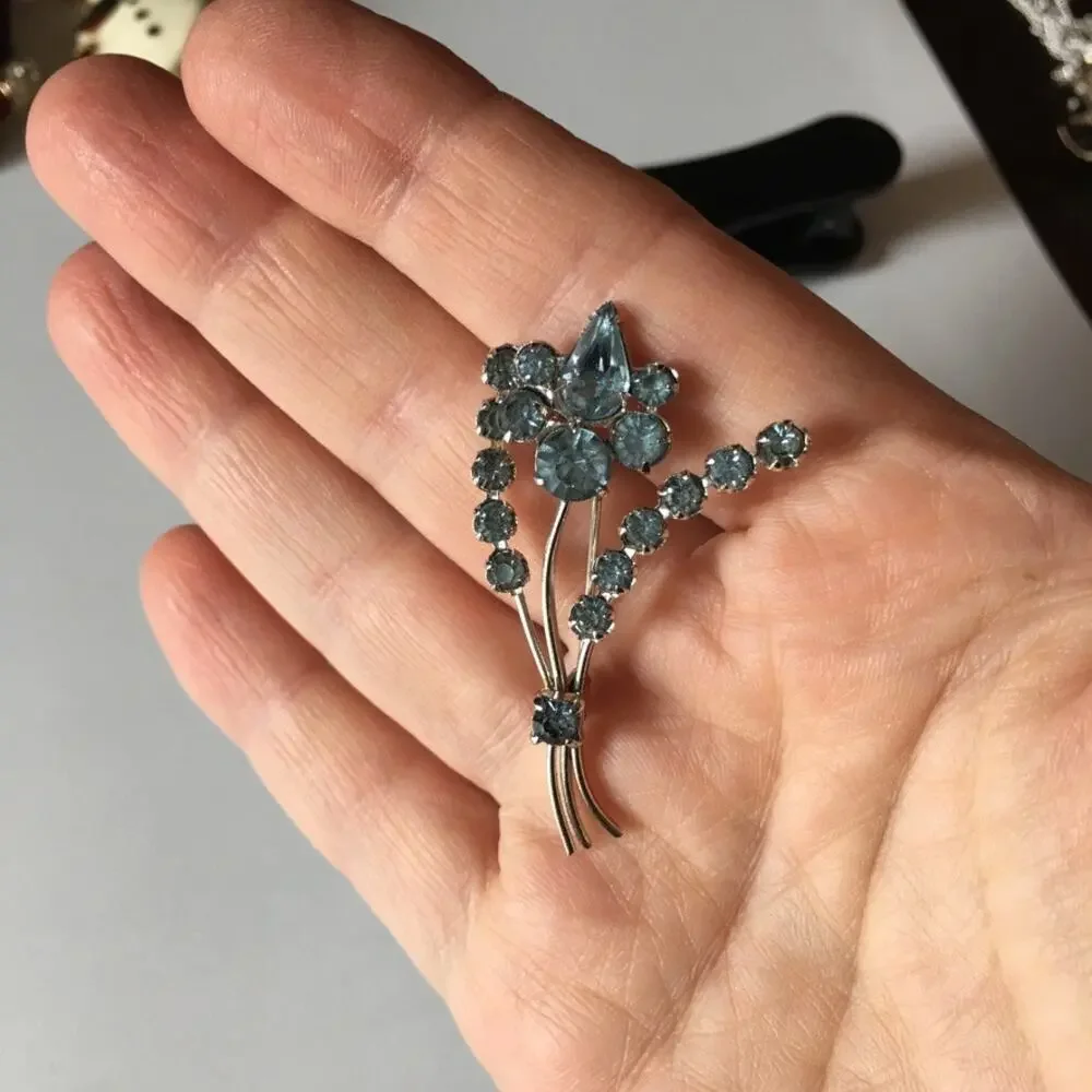 Austrian crystal flower brooch, pin - silver tone and pale blue